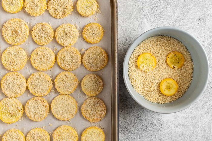 Taste of Home Oven Fried Squash photo of breading the squash.