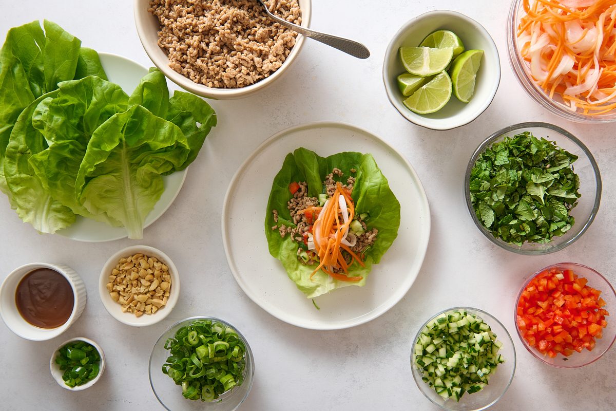 Assembling the wraps with all of the garnishes