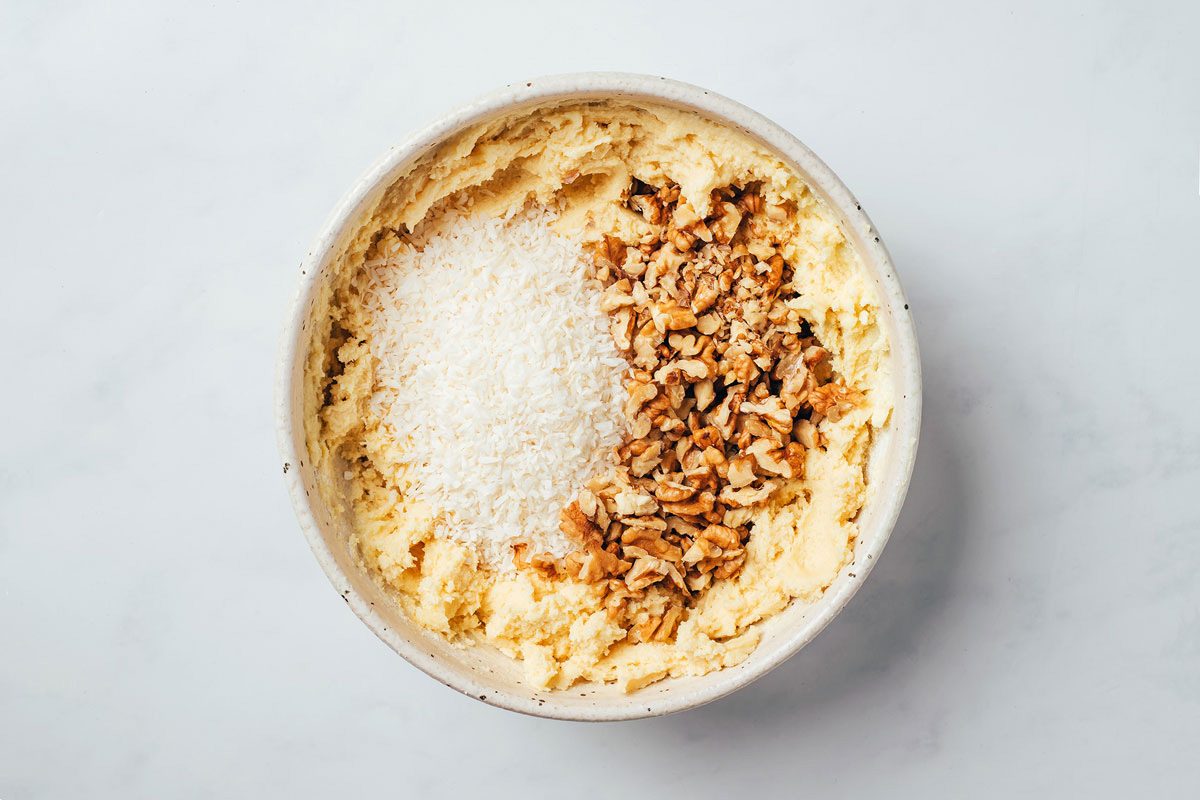 The ingredients for the dough of raspberry bars with coconut being mixed in a large bowl, recipe by Taste of Home