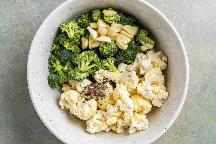 Taste of Home Roasted Broccoli and Cauliflower photo of preparing the broccoli and cauliflower.