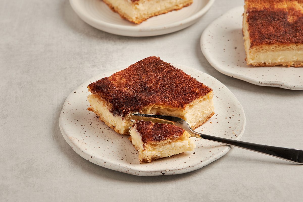This sopapilla cheesecake recipe by Taste of Home uses only a handful of ingredients, including refrigerated crescent roll dough.
