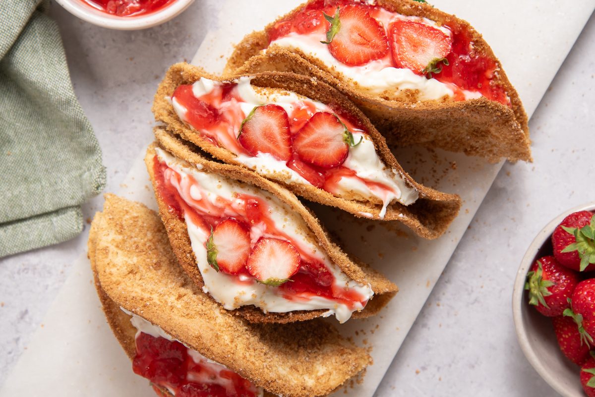 Straberry Cheesecake Tacos On Marble Board