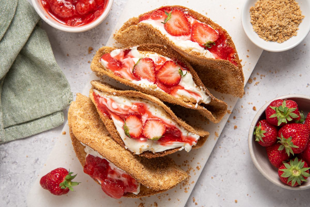 Straberry Cheesecake Tacos On Marble Board