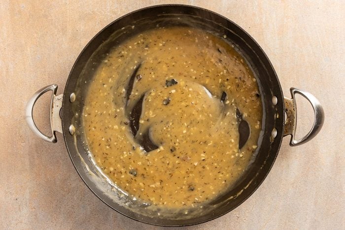 thickening gravy in a pan