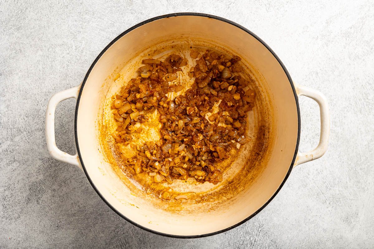 Taste of Home Sweet Potato Soup photo of the onion with garlic and spices added.