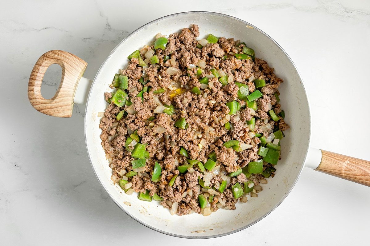 Filling for Taste of Home Taco Burrito in a white skillet