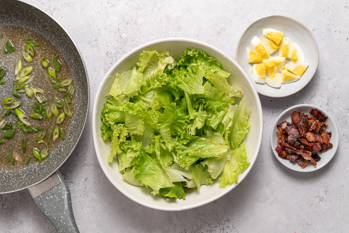 Bowls With Lettuce, Boiled Eggs And Cooked Bacon