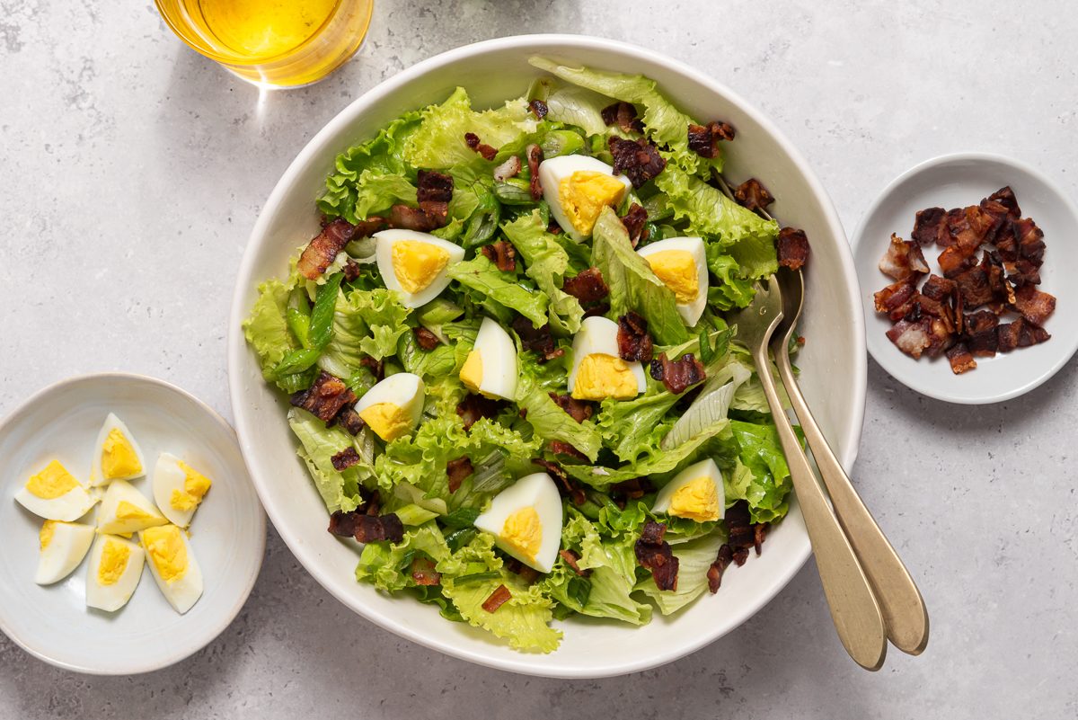 Bowls With Lettuce, Boiled Eggs And Cooked Bacon