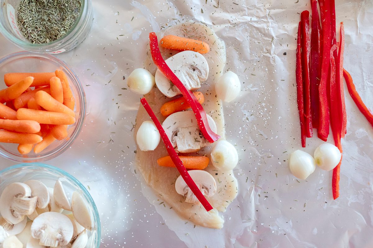 Food Photography By Jackie Alpers Of Chicken Foi Packs With Carrots, Mushrooms And Pearl Onions For Taste Of Home.