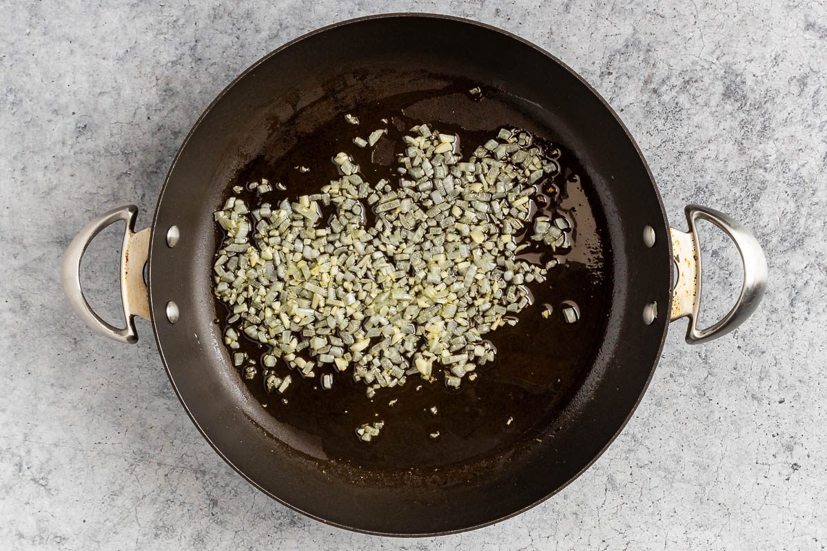 Taste of Home Penne all'Arrabbiata photo of the sautéed onion and garlic.