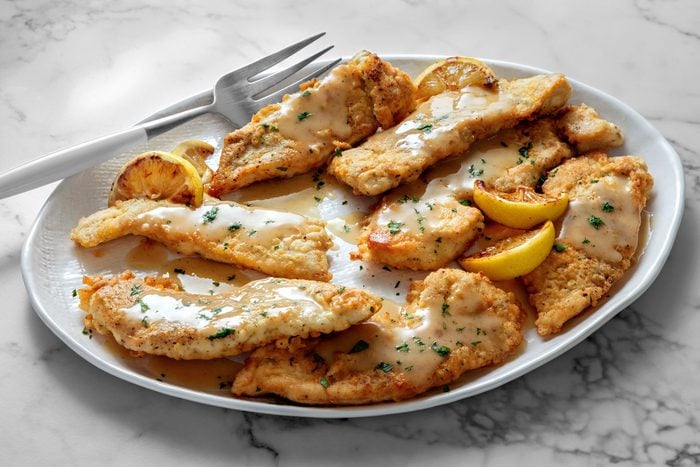 Toss sauce to coat chicken