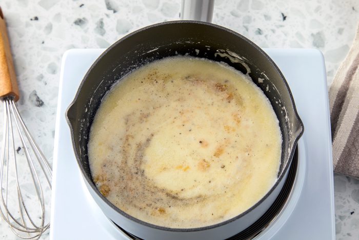 Whisk in salt, pepper, garlic powder, and onion powder.