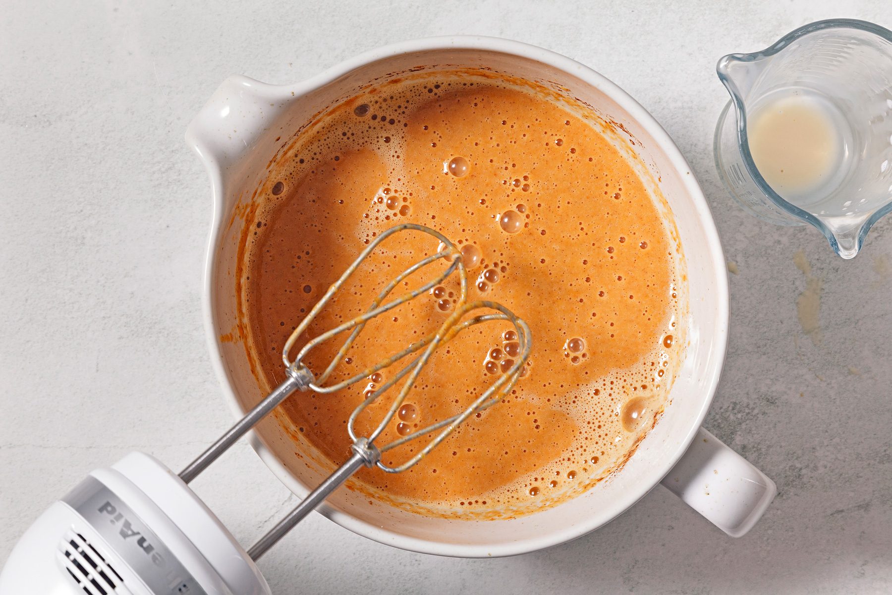 Overhead shot of batter with blender.