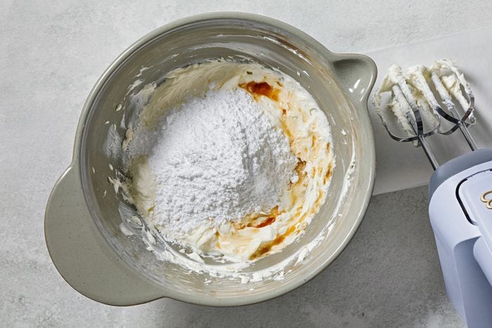 in a large bowl, beat cream cheese and butter on medium speed until smooth.