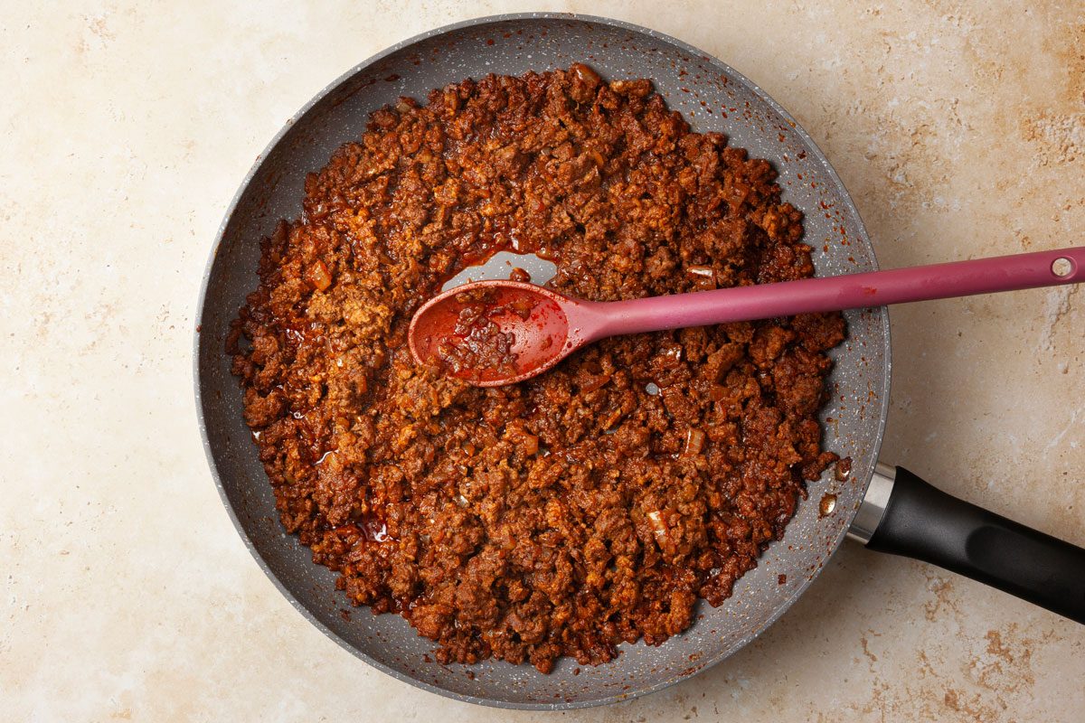 Step 1 of Taste of Home Rhode Island Hot Dogs is to cook the chili