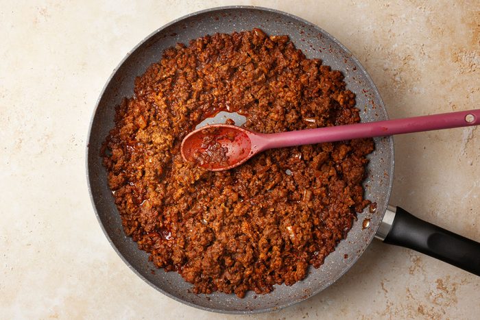 Step 1 of Taste of Home Rhode Island Hot Dogs is to cook the chili