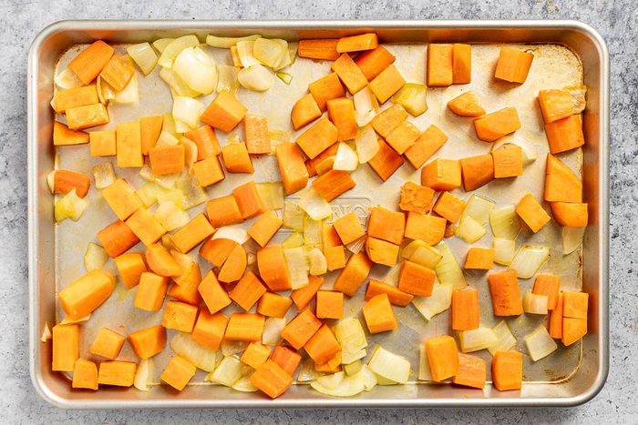 Taste of Home Sheet Pan Kielbasa and Veggies photo of the roasted root veggies on a sheet pan.