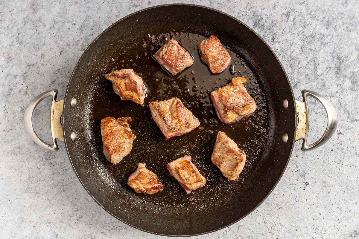 Taste of Home Slow Cooker Pork and Sauerkraut photo of the browned spareribs.