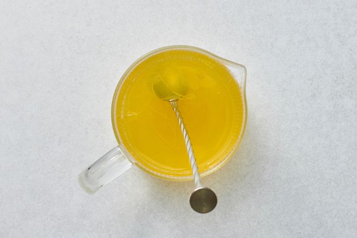 Lemon juice and simple syrup combined in a pitcher