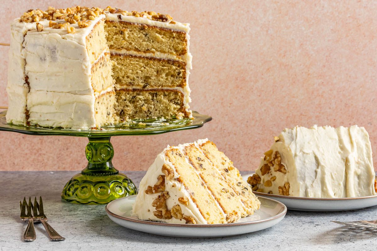 Taste of Home Walnut Cake photo of the final recipe cut into slices and served on plates.