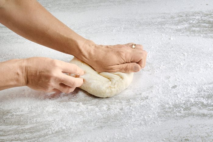 Turn the dough onto a floured surface, and knead until it’s smooth and elastic