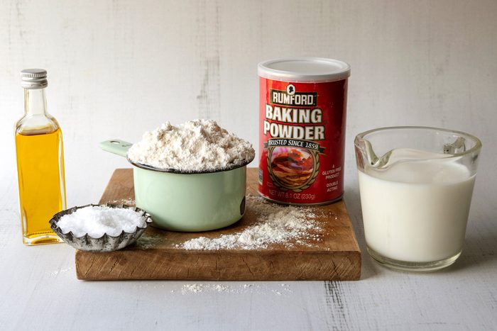 flour, baking powder, salt, milk, olive oil, pizza toppings