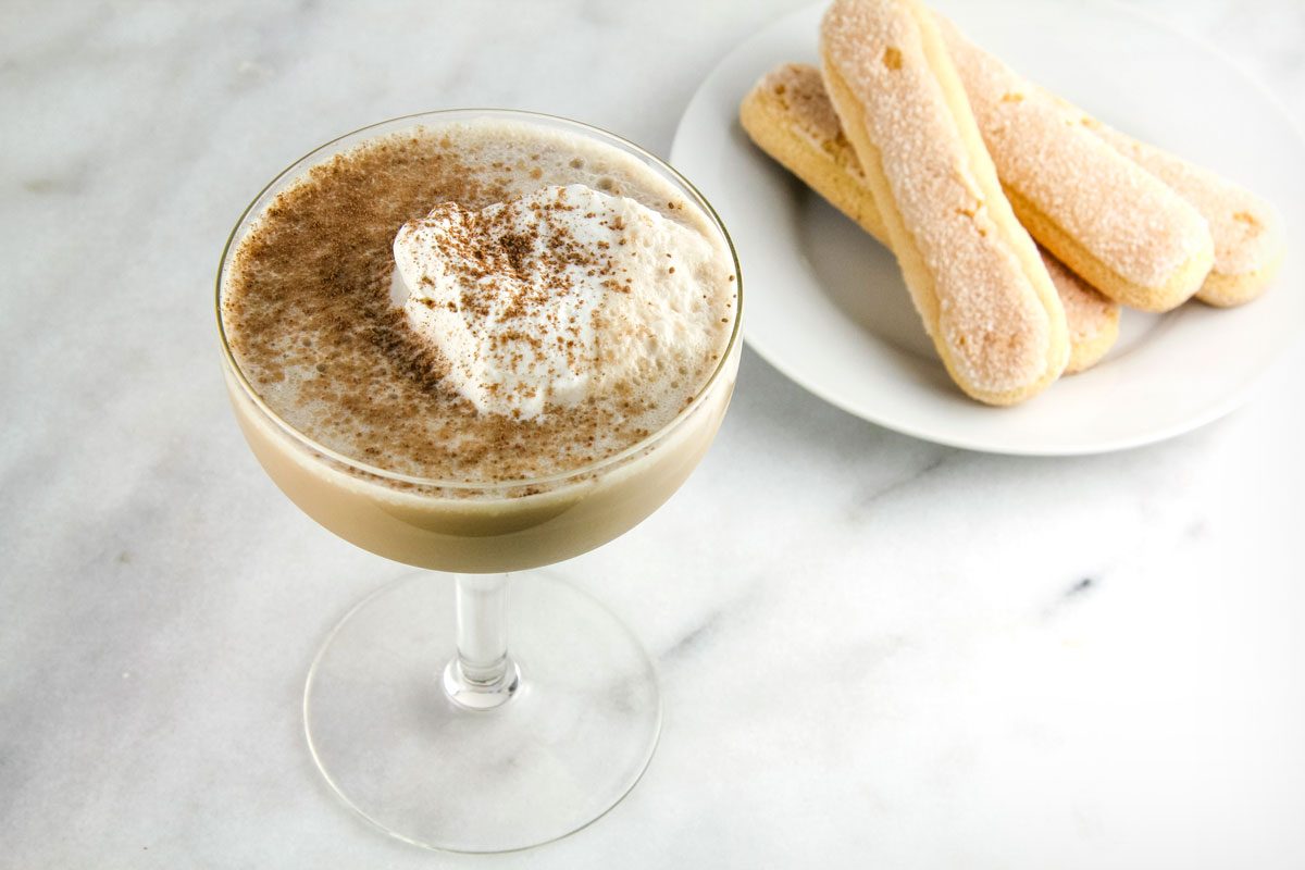 Tiramisu Martini on marble surface.