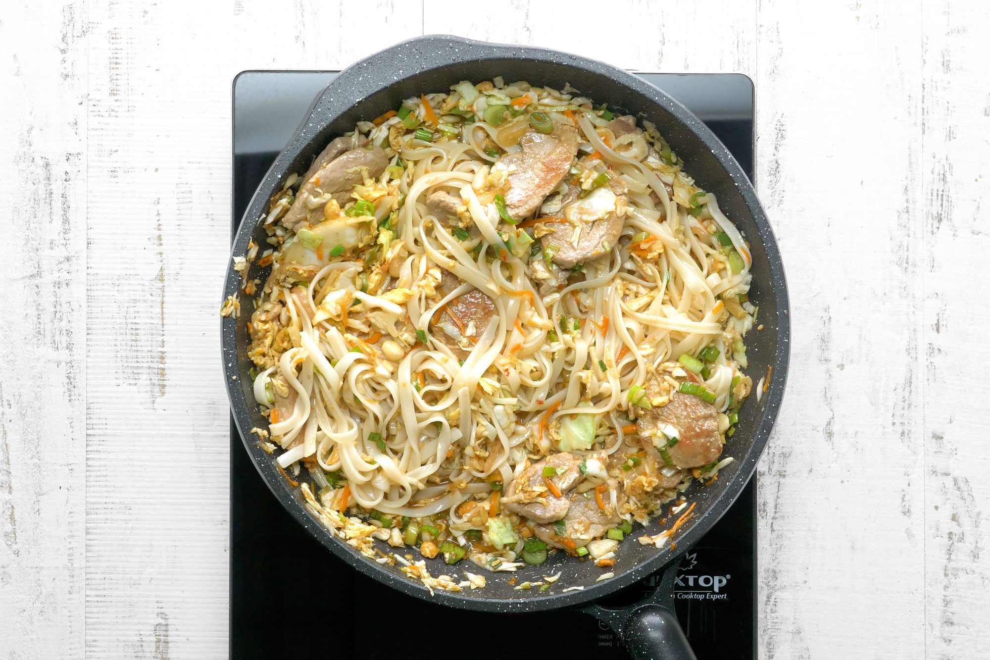 Toss noodles with pork mixture.