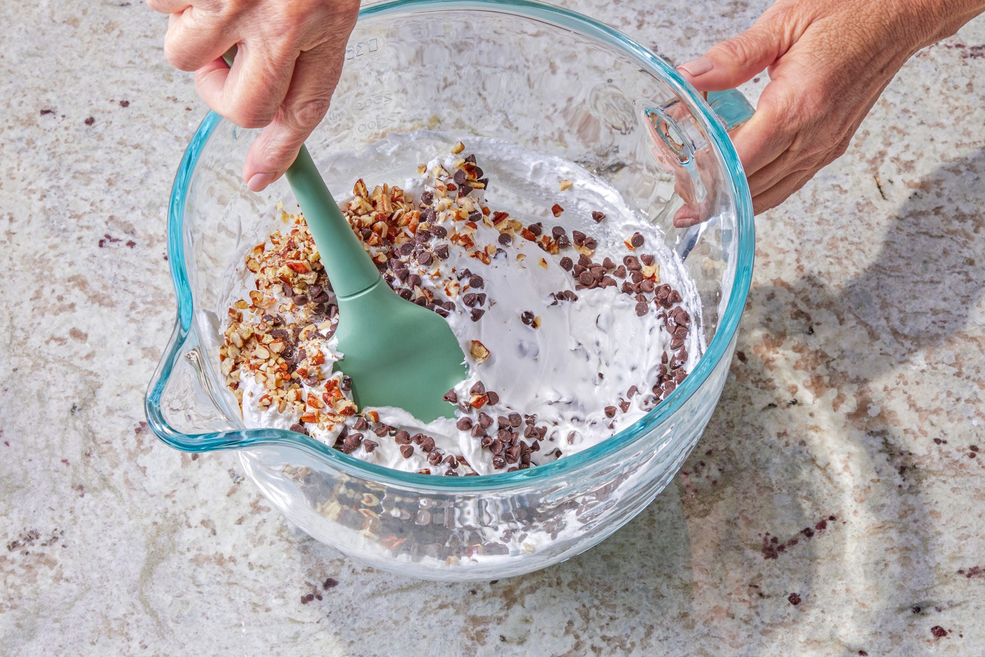 Fold in chocolate chips and nuts.