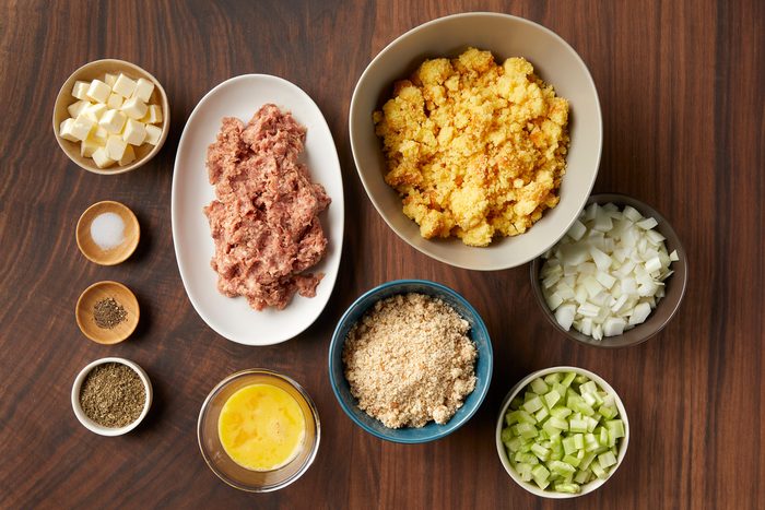 Overhead shot of all ingredients; Preheat oven to 350 degree; spray an 8x8-inch baking dish with cooking spray; set aside; wooden surface