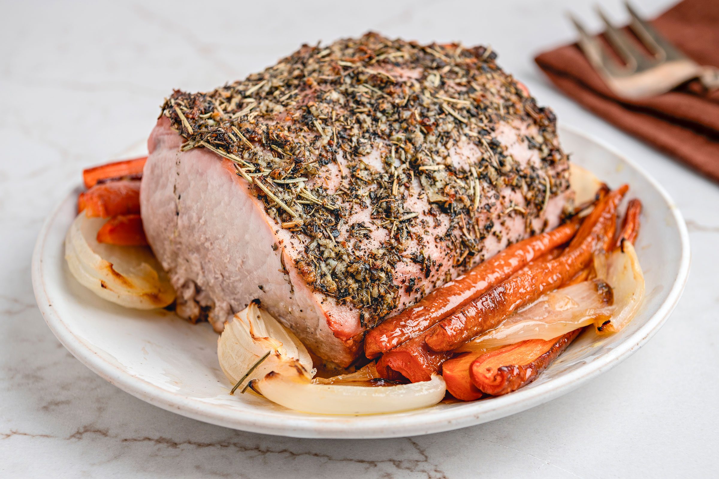 Italian Pork Loin served on a white plate