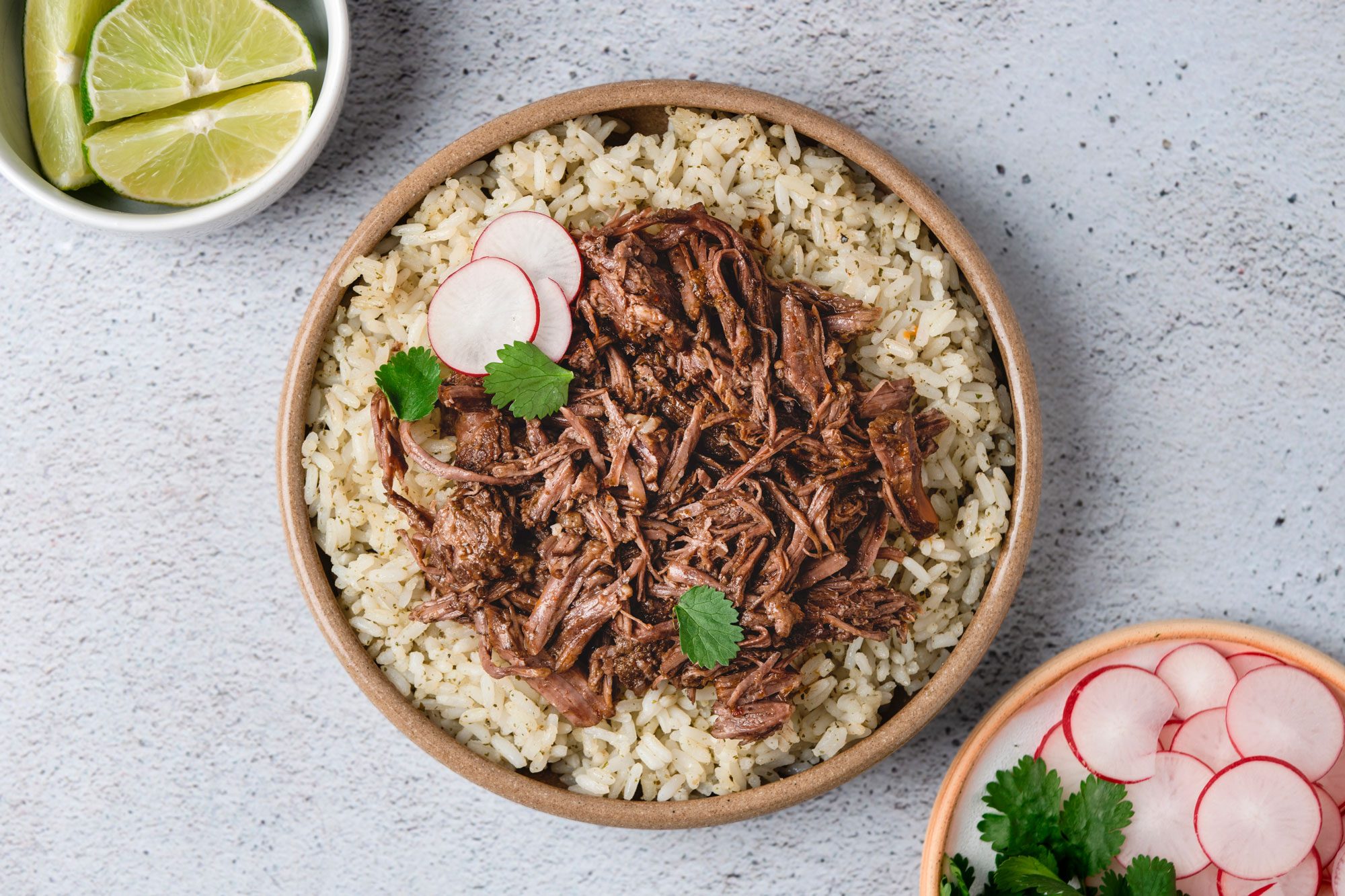 Slow Cooker Barbacoa is ready and served in plate
