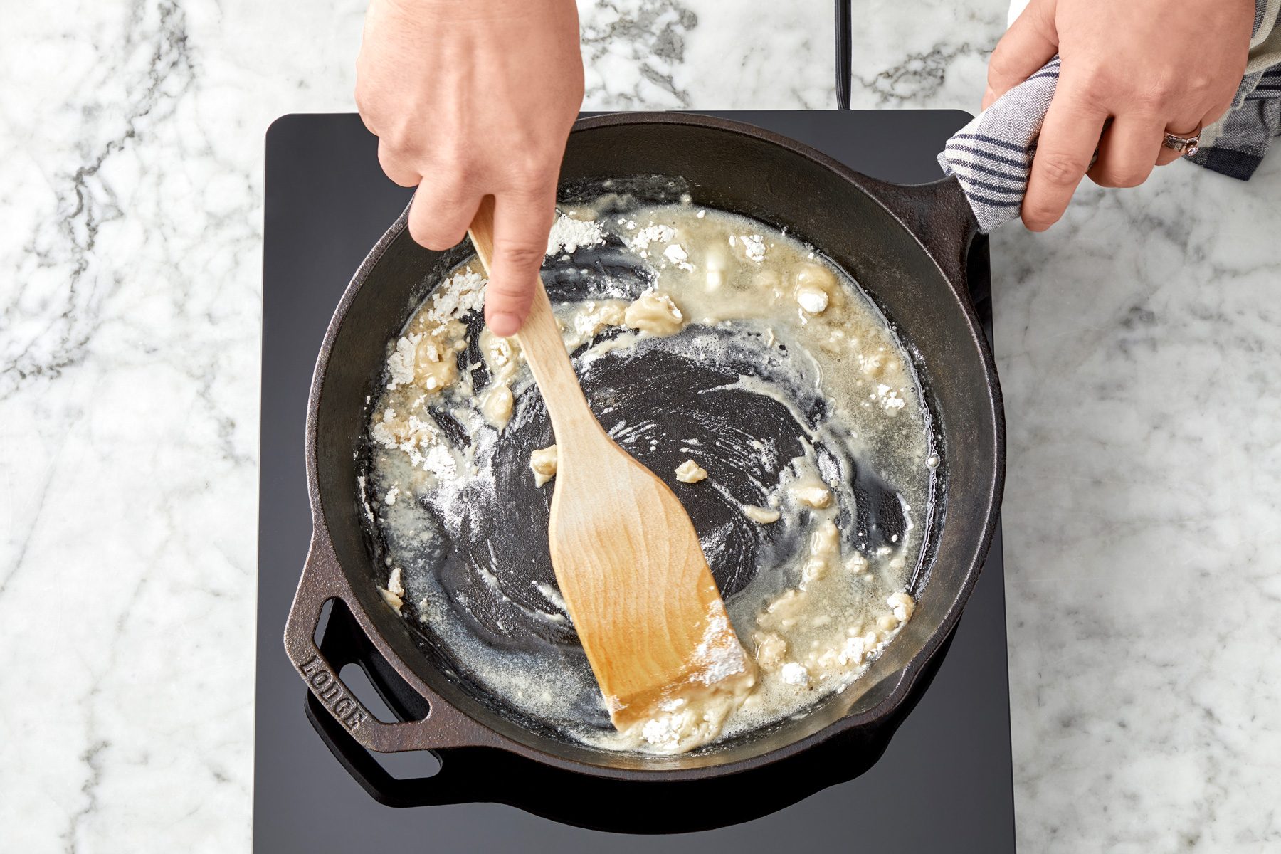 In cast iron skillet, heat butter, stir in flour