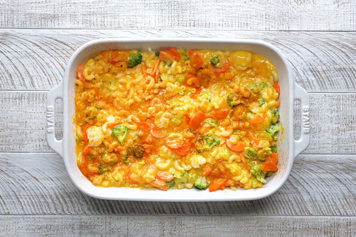 cheese sauce added to macaroni mixture