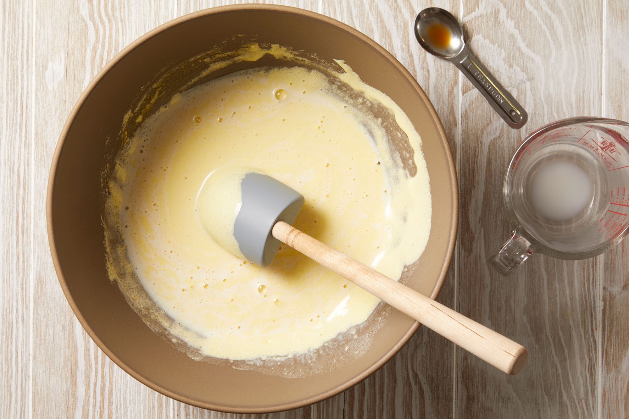 Gradually beat in 3/4 cup sugar and butter. Stir in milk and vanilla.