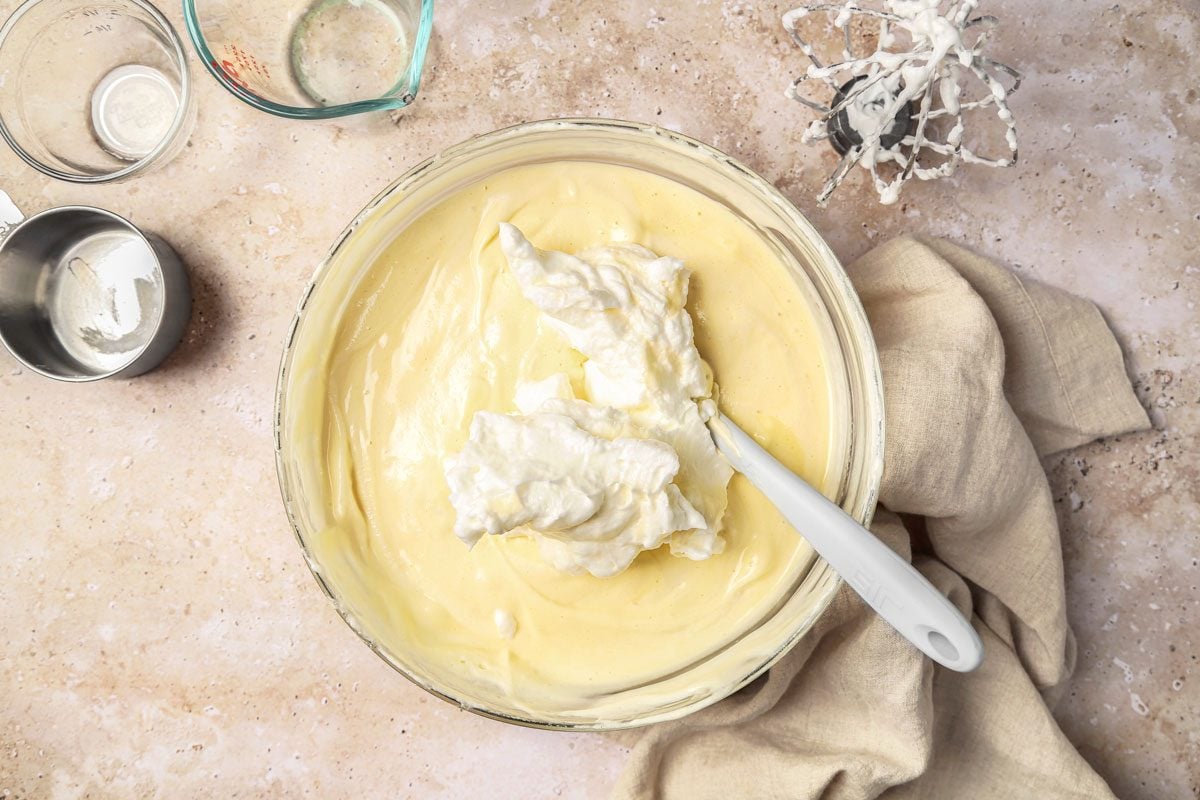 Add cream; egg whites into batter