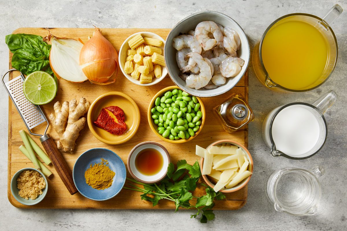 onions, broth, seasonings, curry, shrimp, edamame, coconut milk, baby corn, bamboo shoots, fresh herbs and lime