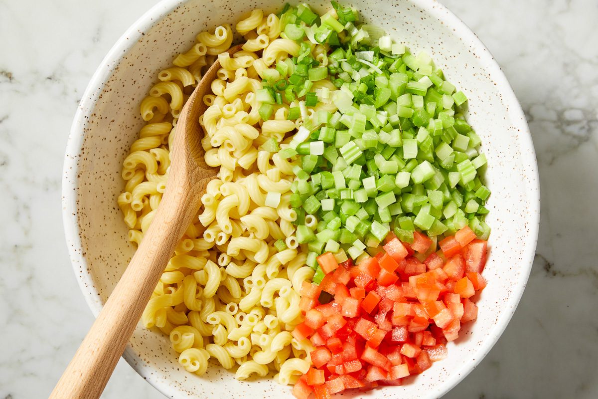 chopped tomato, celery and green onions in a large bowl