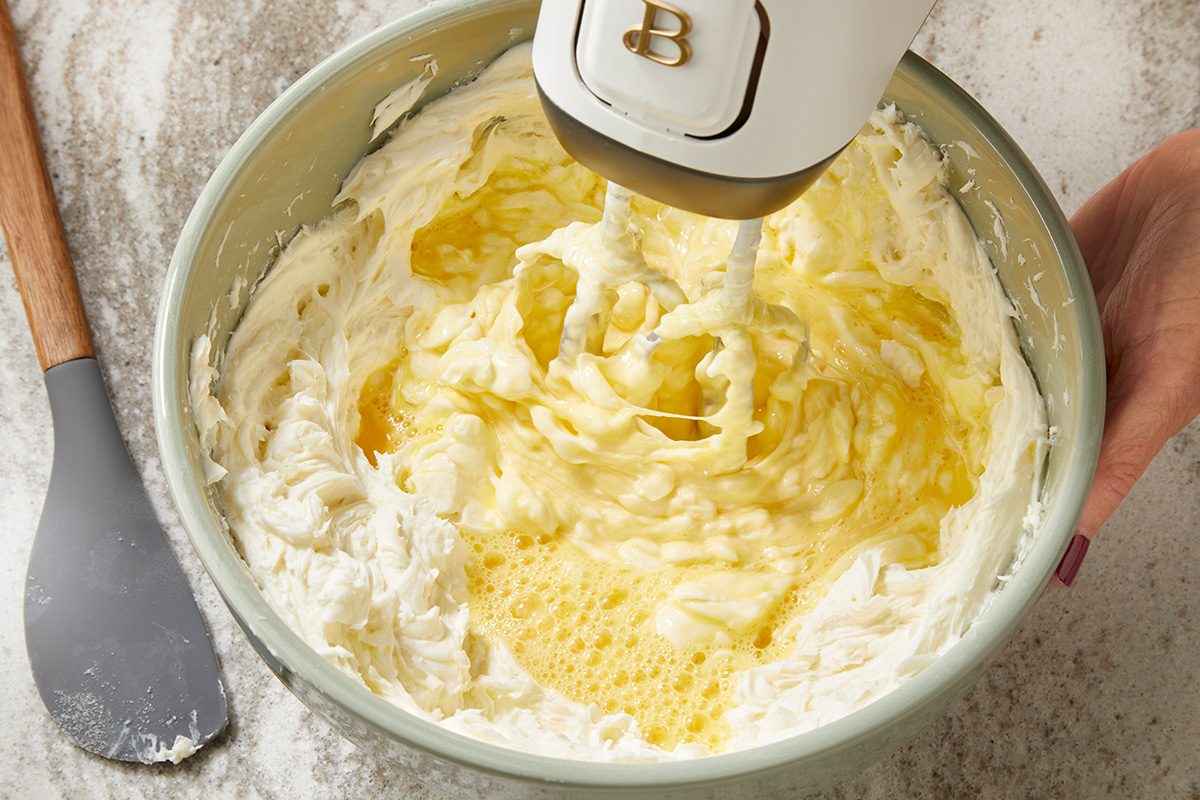 in a large bowl beat cream cheese; sugar and lemon juice until smooth; Add eggs