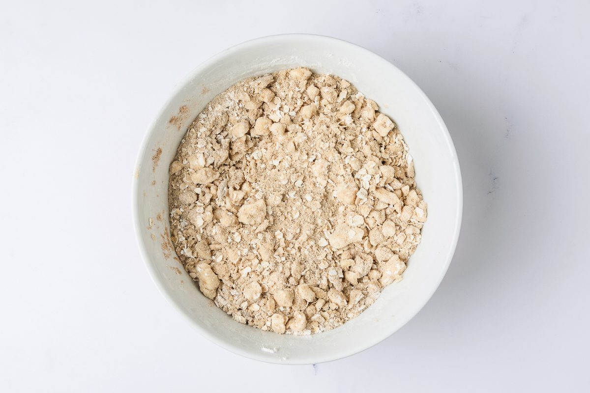 oats, brown sugar, flour, nutmeg and cinnamon combined in a bowl