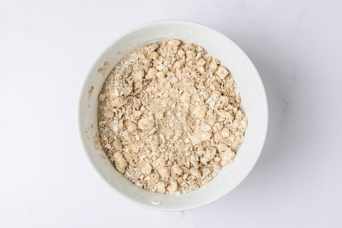oats, brown sugar, flour, nutmeg and cinnamon combined in a bowl