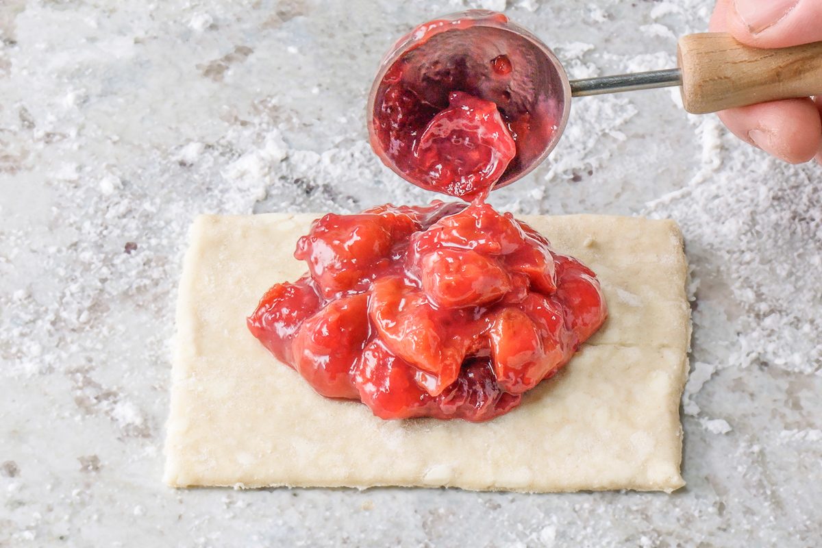 tablespoons of the cherry filling spooned onto dough rectangle