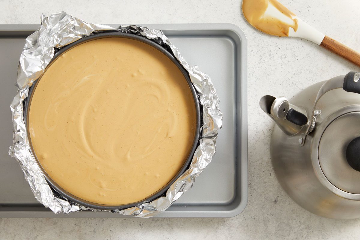 Place springform pan in a large baking pan; add 1 in. of hot water to larger pan.
