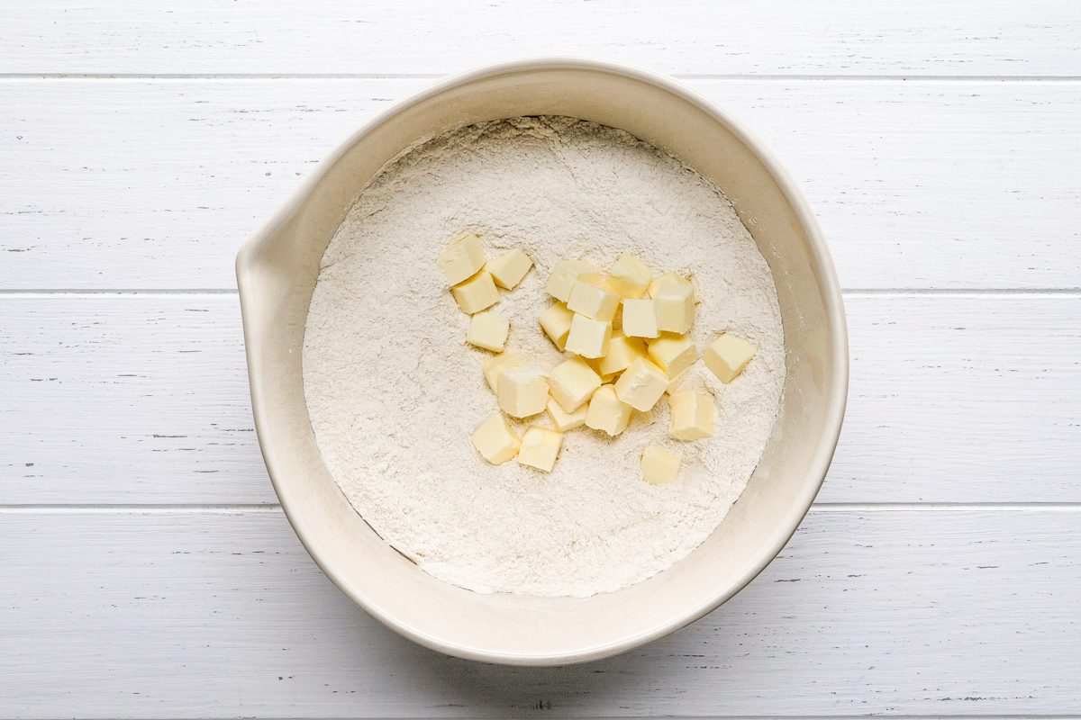 cold cubed butter cut into the whisked mixture