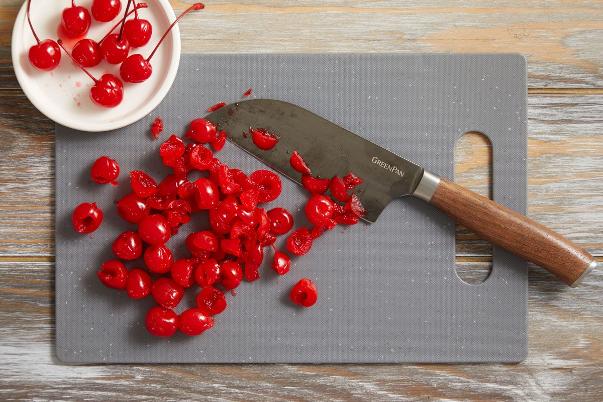 Set aside eight whole cherries for garnish. Chop the remaining cherries; set aside.