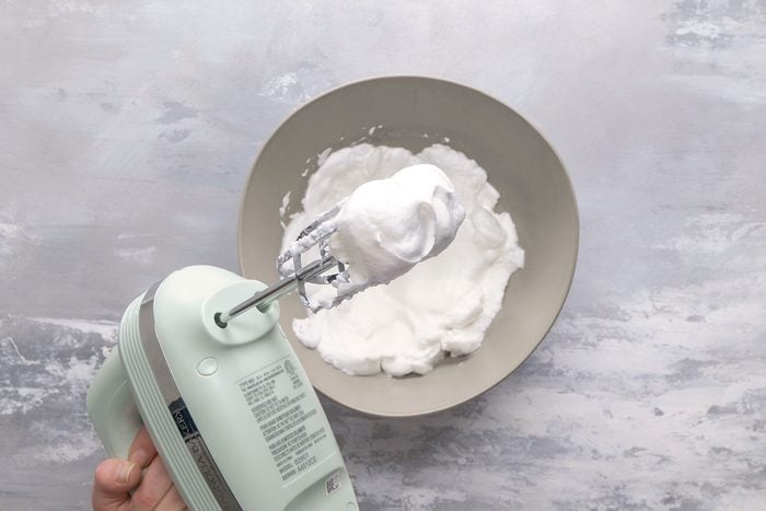 In a small bowl, beat the egg whites on high speed until stiff peaks form.