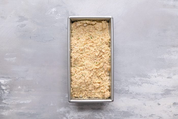 Transfer to a greased 8x4-in. loaf pan.