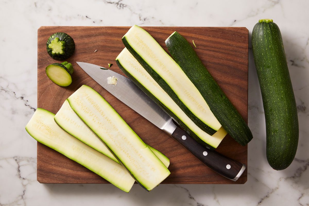 Cut zucchini lengthwise into 1/4-in. slices.