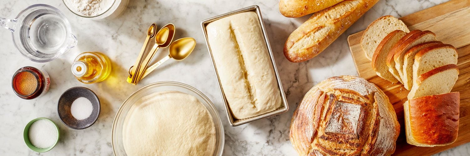 Taste of Home Back To Baking School 2025 banner showing from left to right: yeast bread supplies and ingredients, bread proofing in progress, and finished baked loaves