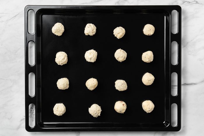 cookie dough balls placed 2 inches apart on ungreased baking sheet